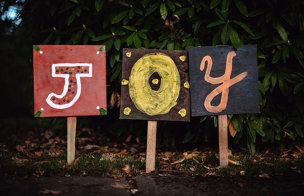 Decorative signs spelling JOY